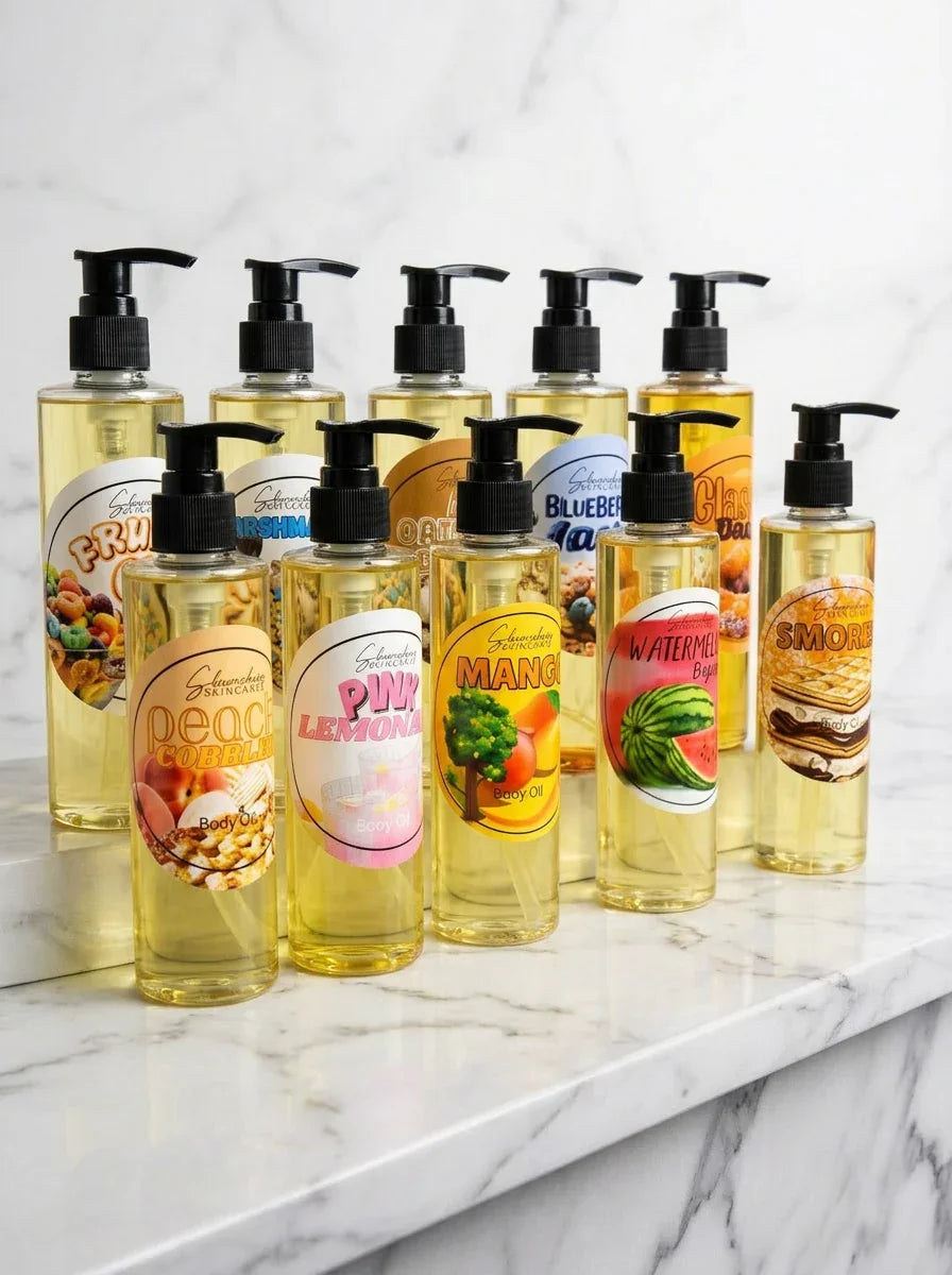 Assorted bottles of soap with pump dispensers on a marble surface